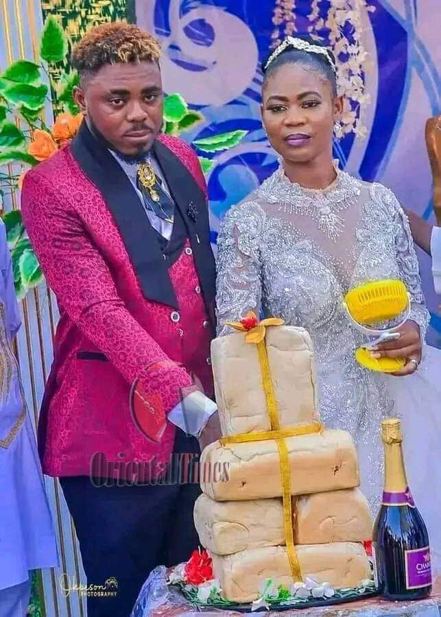 couple using bread as cake